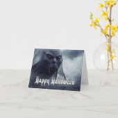 地獄のような風景の中の黒い幽霊 – ハロウィーン カード (黄色い花)