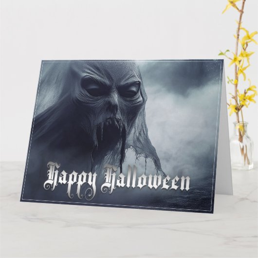 地獄のような風景の中の黒い幽霊 – ハロウィーン カード (黄色い花)