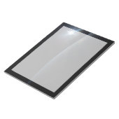 地球の地平線上に沈む太陽。 ノートパッド (アングル)