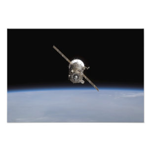 地球のhorizの上のSoyuz TMA-11の宇宙船 フォトプリント