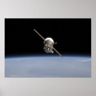 地球のhorizの上のSoyuz TMA-11の宇宙船 ポスター