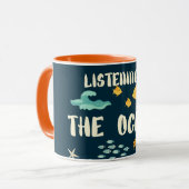 地球聞の日の海だ マグカップ (正面左)