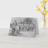 塀の6人の子供を持つラリーLarom カード (黄色い花)