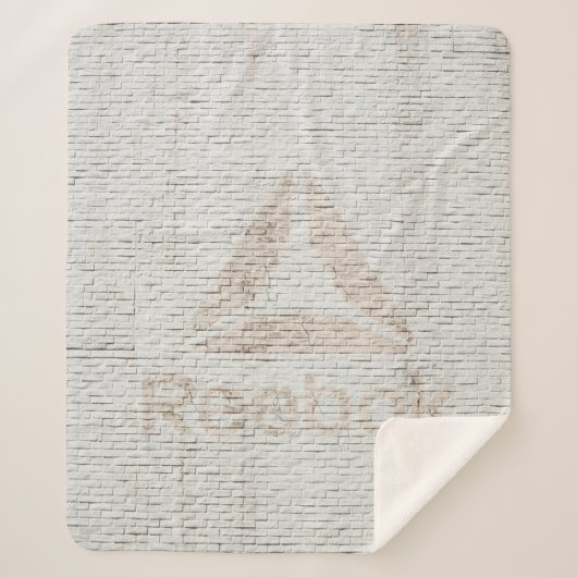 壁に付いたリーボックのロゴの写真を閉じる シェルパブランケット (正面)