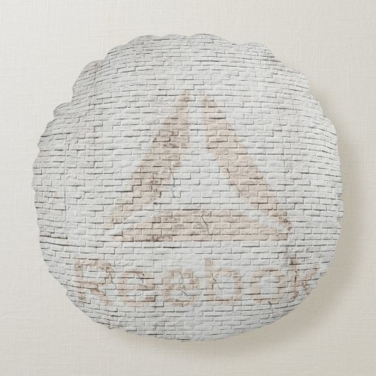 壁に付いたリーボックのロゴの写真を閉じる ラウンドクッション (正面)