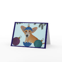 壊れたクリスマスオーナメントに入ったチワワ
