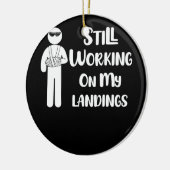 壊れた腕の子供たちが着陸に取り組む セラミックオーナメント (左)