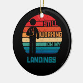 壊れた腕の子供たちが着陸に取り組む セラミックオーナメント (左)