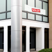 売った！ 横断幕 (ビルの外側)