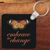 変化を受け入れる – オレンジ色の蝶 キーホルダー (裏面)