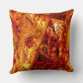 変色して茶色がかったオレンジ色のカーニバルマスク クッション (裏面)