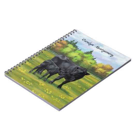 夏の牧草地に黒アンガスカウカワイカフカーフ ノートブック (左側)