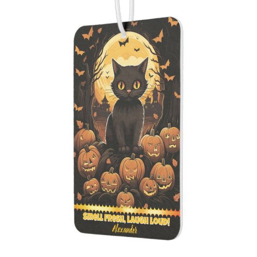 夕暮れ時にカボチャ白熱［赤熱］光を放つの中で黒猫 カーエアーフレッシュナー (左)