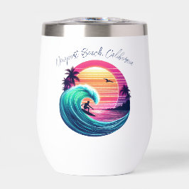 夕暮れ時に波に乗る