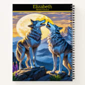 夕暮れ時の月明かりの下白熱［赤熱］光を放つで狼の歌 ノートブック (裏面)