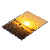 夕暮れ走の時に犬と少年の少年 ノートブック (左側)