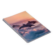 夕焼けのイルカが波に飛び跳ねるノート ノートブック (右側)