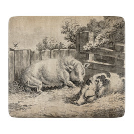 外のペンで藁に寝ている2匹の豚 カッティングボード