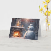 外の暖炉のあるクリスマスの雪だるま カード (黄色い花)