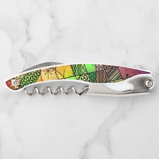 多彩、はっきりしたでアートで抽象的なパターン（の模様が）ある ソムリエナイフ (裏面)