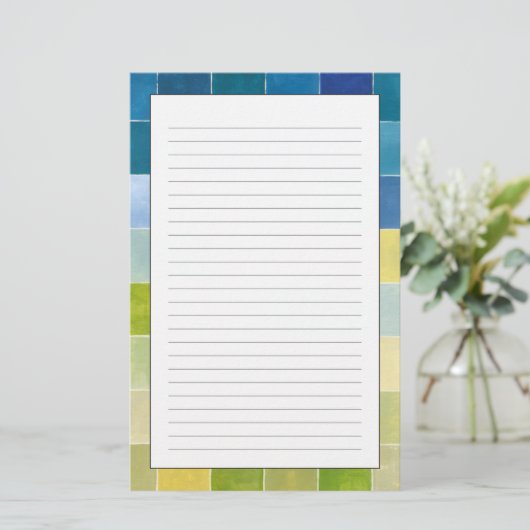 多色のピクセル化された正方形を持つ横 便箋 (スタンド正面)