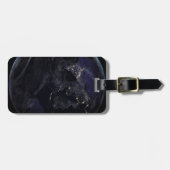 夜にアジアの都市の光を示す完全な地球。 ラゲッジタグ (正面横)