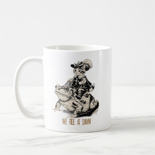 夜明けに騎乗せ!三銃士の子猫とカエルのマグカップ コーヒーマグカップ (左)