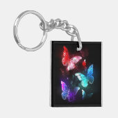 夜白熱［赤熱］光を放つの蝶3匹 キーホルダー (正面左)