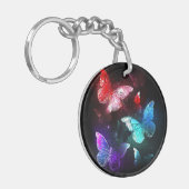 夜白熱［赤熱］光を放つの蝶3匹 キーホルダー (正面左)