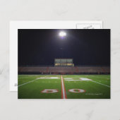 夜間のライトアップされたアメリカンフットボール場 ポストカード (正面/裏面)