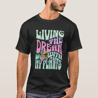 夢を生きる植物を愛する女の子を育てる Tシャツ