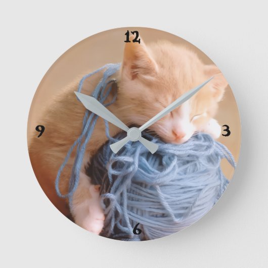「夢を織り、一度にワンステッチ」 ラウンド壁時計 (正面)