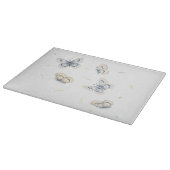 夢心地のフライトで蝶の青とクリーム カッティングボード (角)