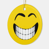 大きいにやにや笑いの顔のオーナメント セラミックオーナメント (左)