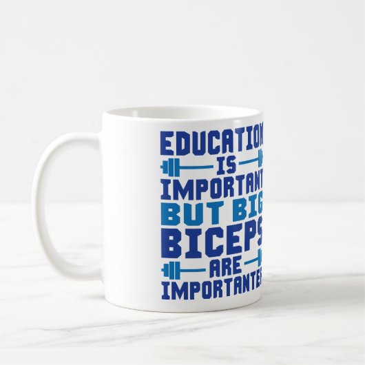 大きい二頭筋は教育よりImportanterです コーヒーマグカップ (左)