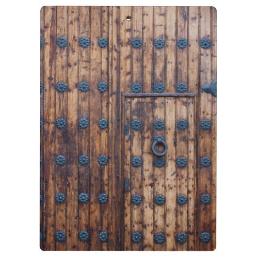 大きい補強された木のドア内の古く小さいドア クリップボード (裏面)