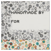 大きなキルトラベル – ペイズリーとギンガム ファブリック (クローズアップ)