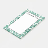 大きな白い雪の落下する緑のクリスマスを行う ポストイット (アングル)