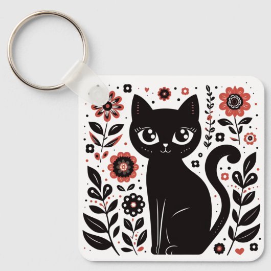 大きな目の黒い花柄の猫 キーホルダー (正面)