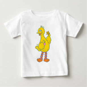 大きな鳥がクリスマスのオーナメントを持っている ベビーTシャツ