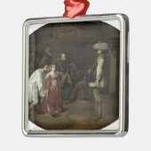 大尉の前に持って来られる メタルオーナメント (左)