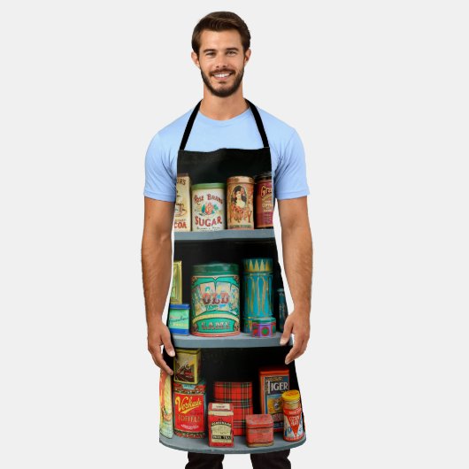 大量のカラフルヴィンテージ缶が表示される エプロン (着用した状態)
