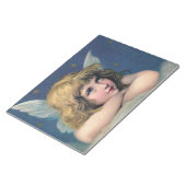 天の天使が空の雲の上で空想する ノートパッド (アングル)