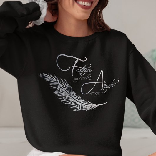 天使が近づくと羽が現れる スウェットシャツ