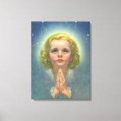 天使の金髪の少女が光輪と星を纏って祈る キャンバスプリント (正面)