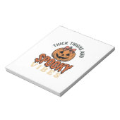 太ももとスプーキーな雰囲気のかぼちゃ ハロウィン デ ノートパッド (回転)