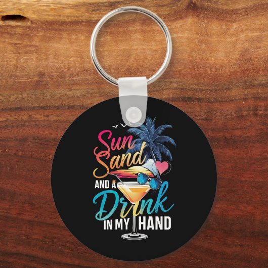 太陽の光 砂浜と手に飲み物 ビーチクルーズ キーホルダー (正面)