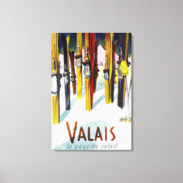 太陽の国 – 雪の中に立つスキー キャンバスプリント