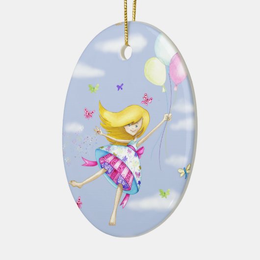 女のかわいらし子の気球の妖精の贈り物のファンシー飛行 セラミックオーナメント (左)