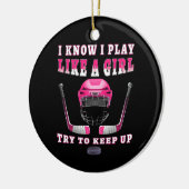 女の子が遊ホッケーを始め保てる セラミックオーナメント (左)